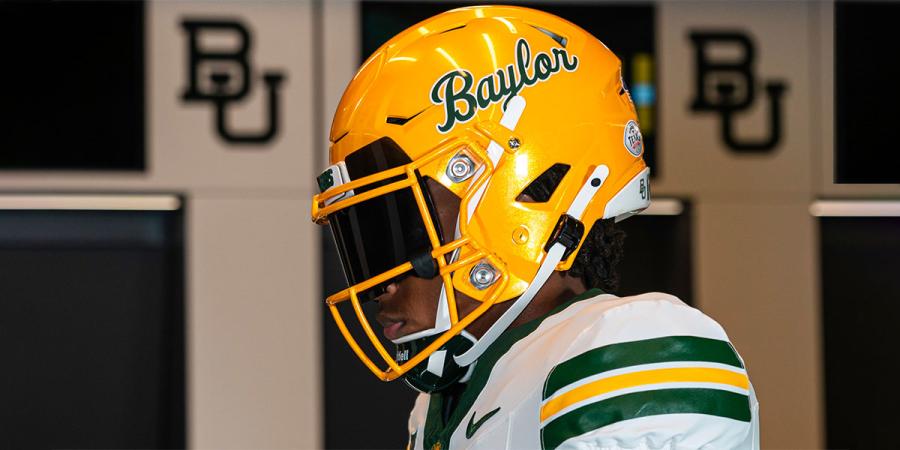 A player wearing Baylor's new gold football helmets with the script "Baylor"