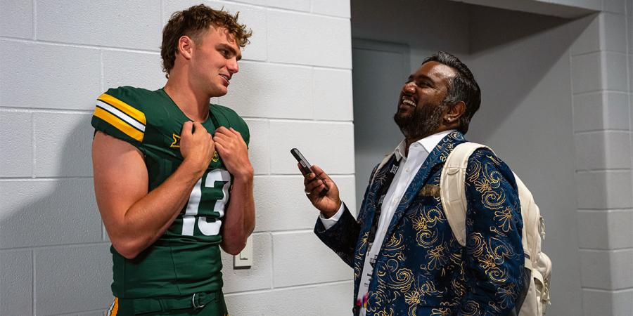 Shehan Jeyarajah (right) interviewing Baylor Football's Sawyer Robertson at Big 12 Media Days