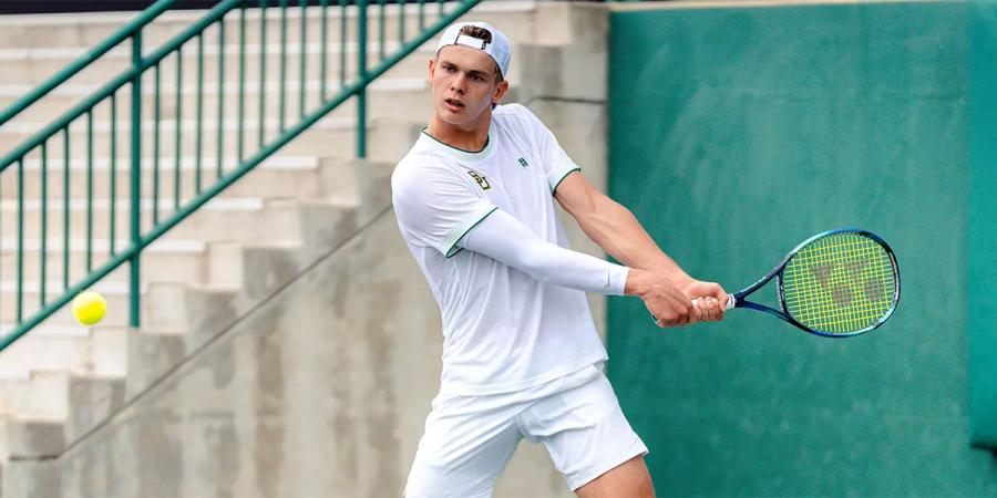 Devin Badenhorst playing tennis