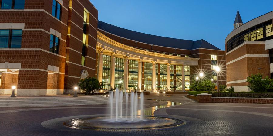 A fountain outside the Baylor Sciences Building at evening